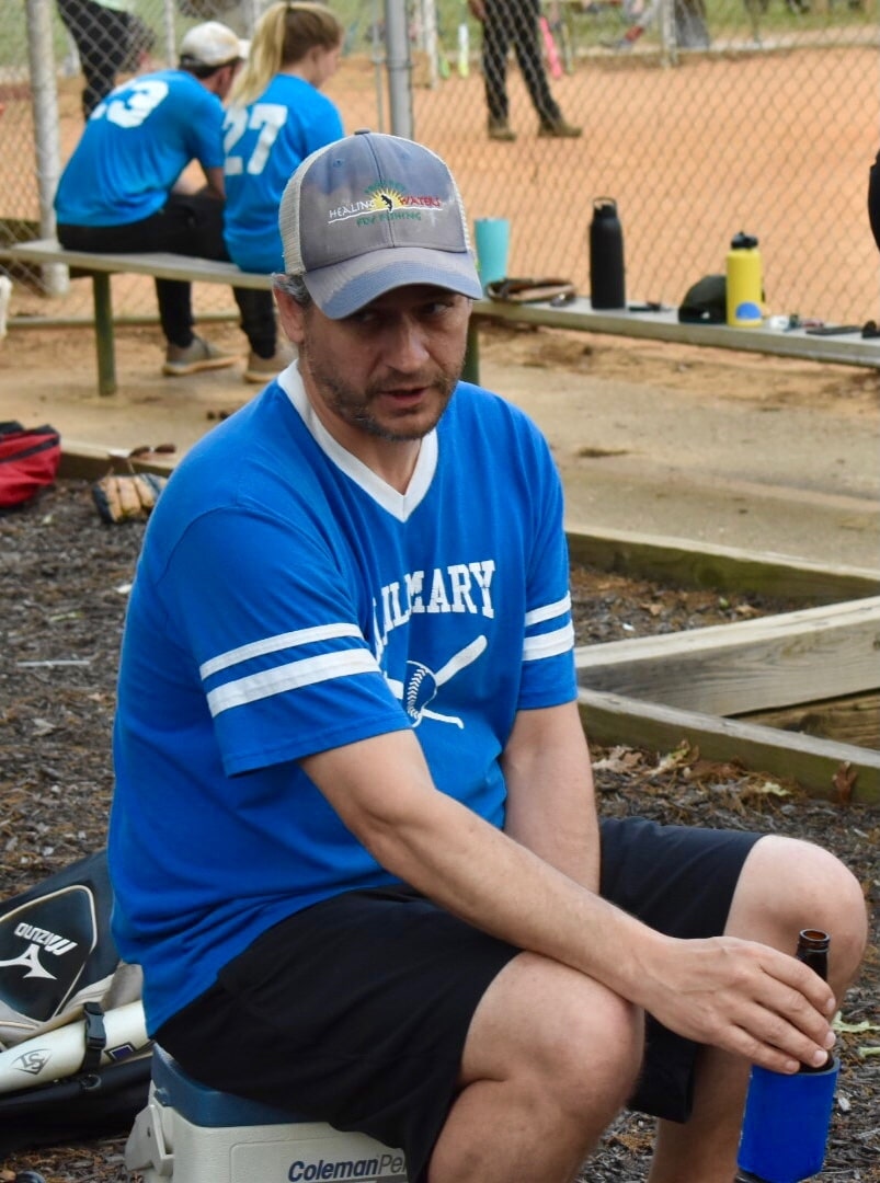Hail Mary SS Brendon waiting in the dugout with what is obviously a root beer.