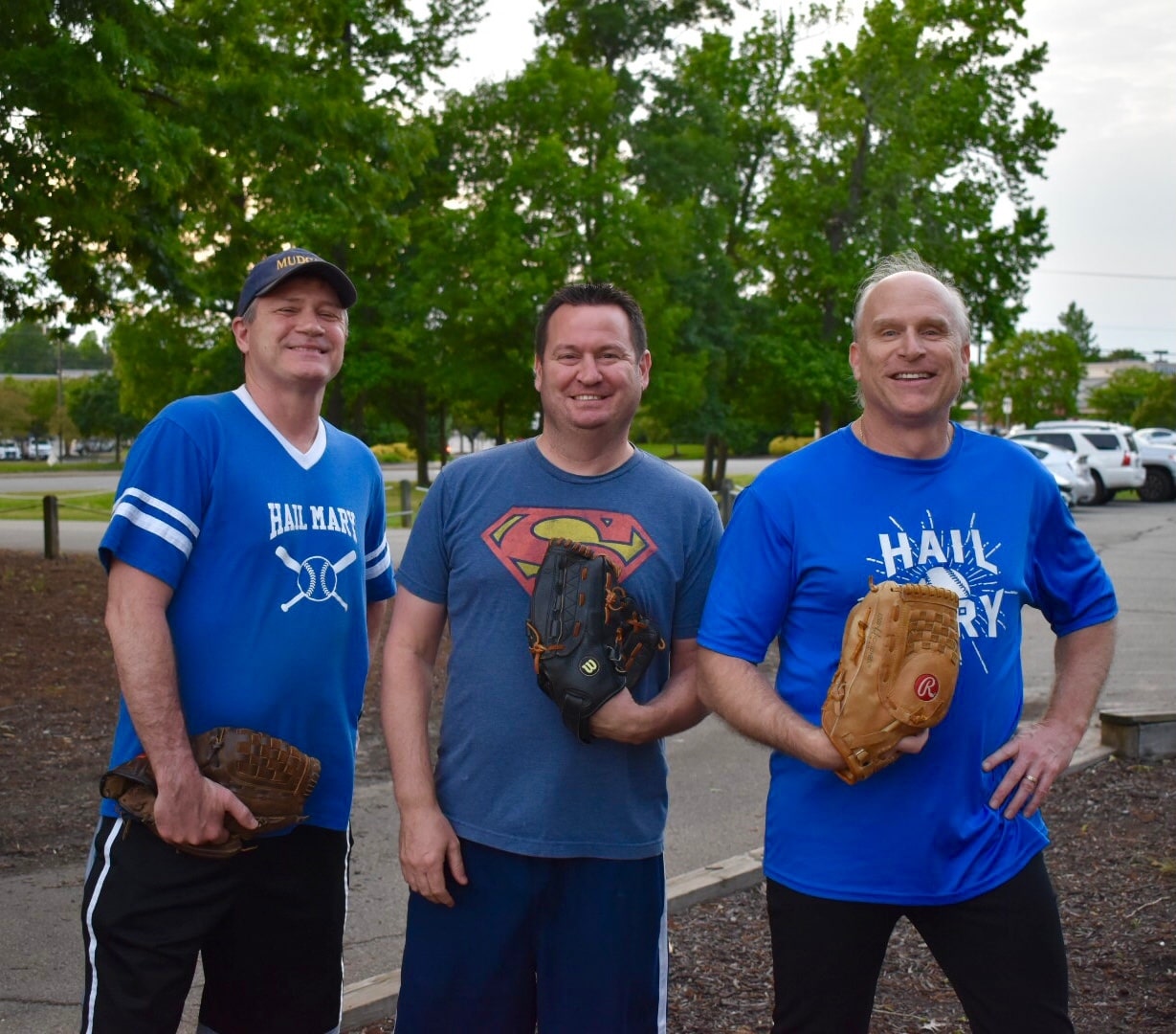 Hail Mary's Duke (1B), Adam (3B/IF) and Brian (LF) post of a photo