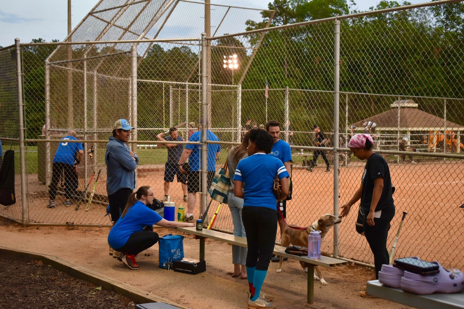 Hail Mary softball at bat, and watching the action at home plate