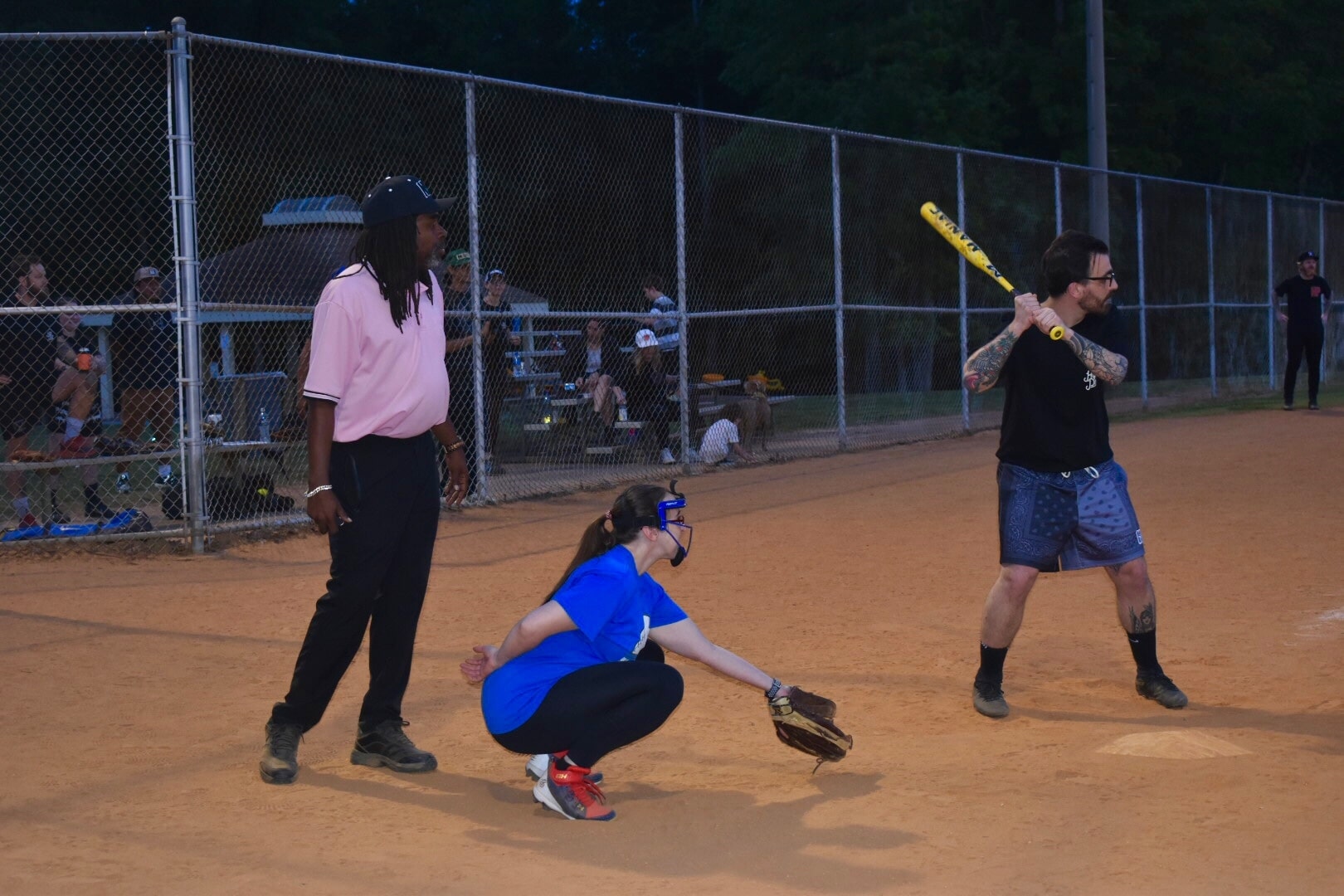 Hail Mary Catcher Liz awaits a pitch at a Hail Mary softball game