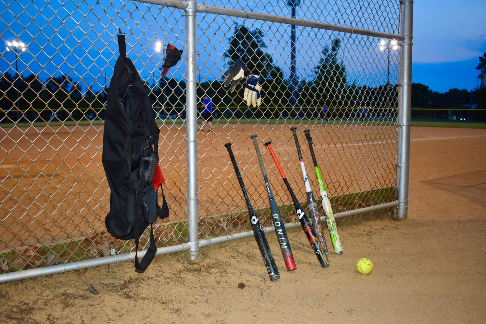 A row of bats belonging to Richmond Virginia's Hail Mary Coed Softball Team