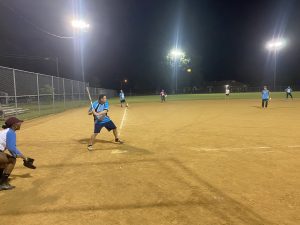 Adam (3B) at bat and about to hit a homerun