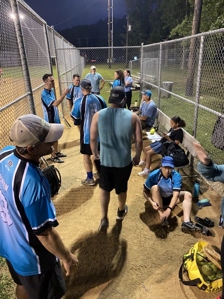 Hail Mary waits to bat between innings of our 9/3 coed softball games