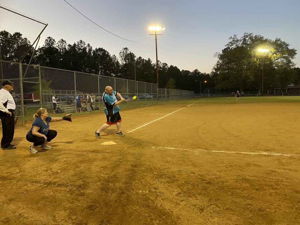 Brent (P) slugs the ball