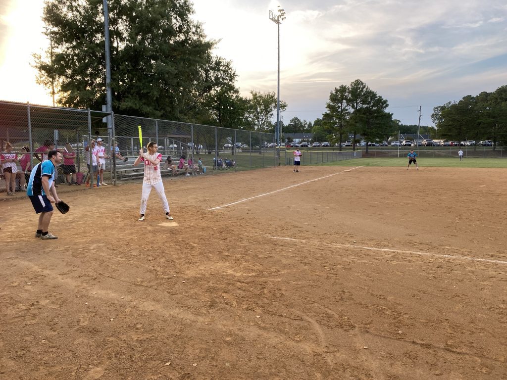 A group of people playing a game of softball in Richmond, Virginia.