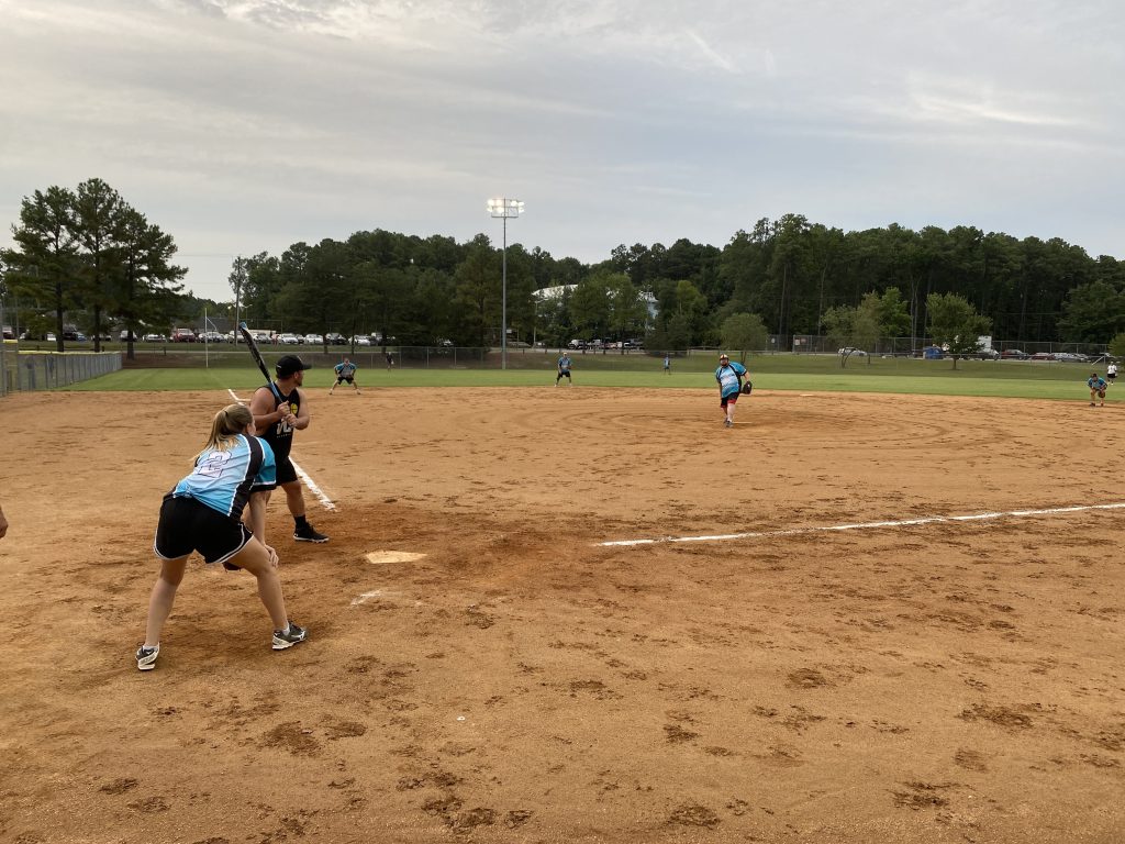 A group of people playing RVA Softball.