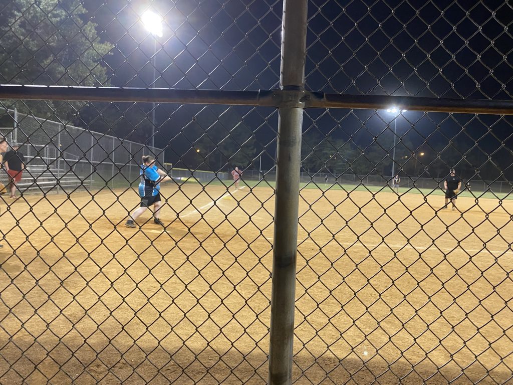 Anna about to crush the ball at the NSA Softball Team's Richmond Virginia field.