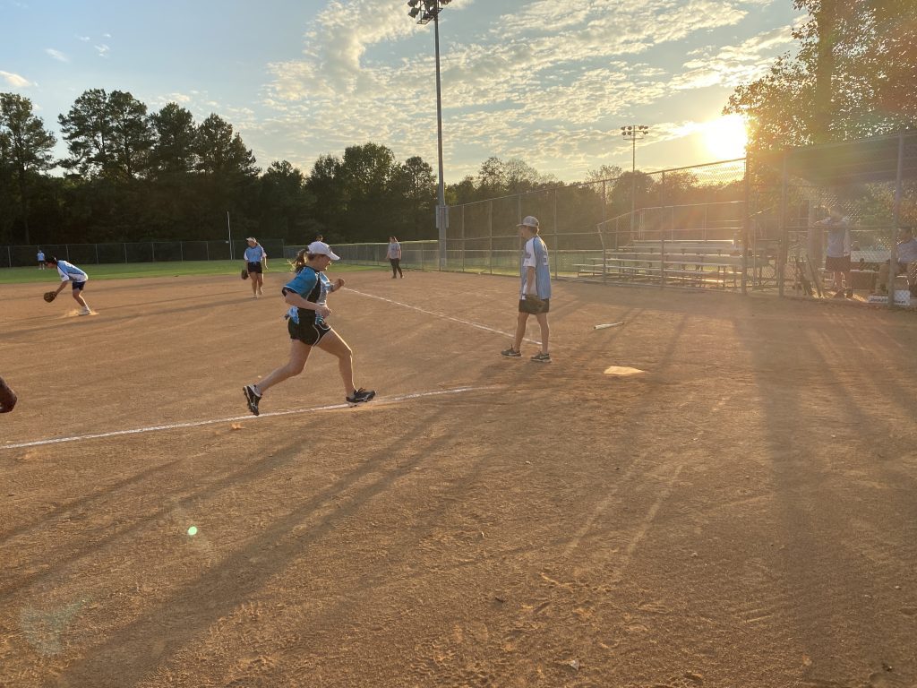 Lauren coming in for another Hail Mary softball run scored!