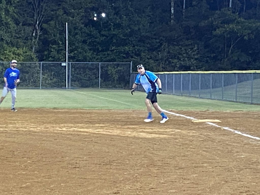 Brian on first base, taking off for second.