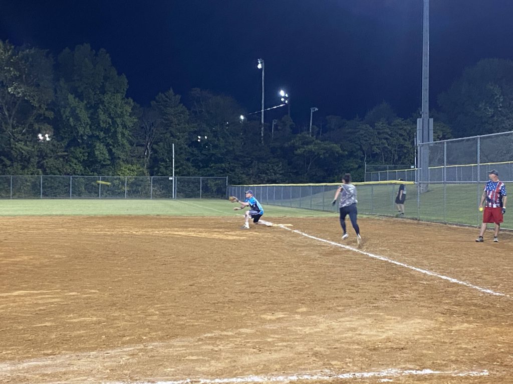 Duke making the stretch play at first for the OUT!